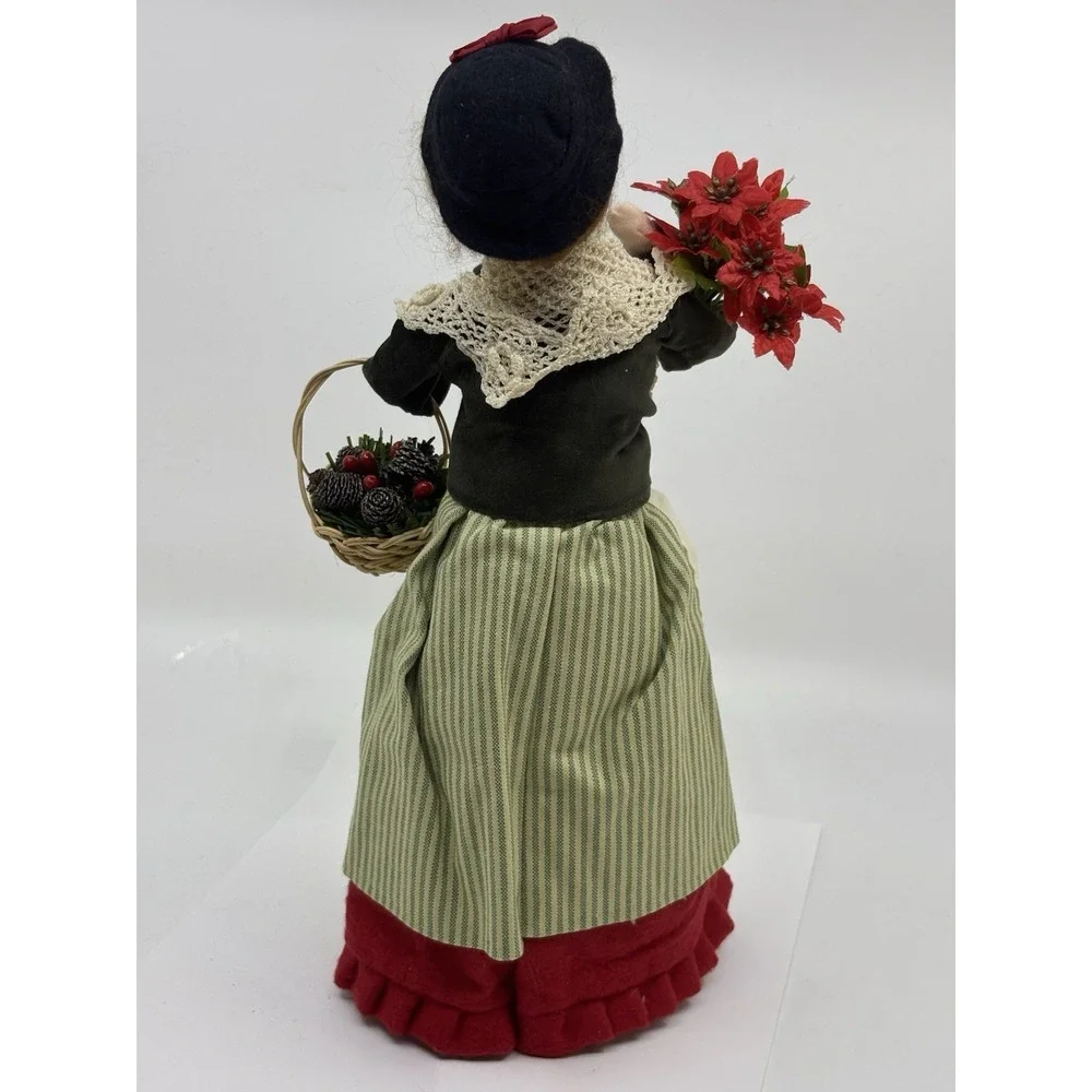 2009 Woman Selling Holiday Flowers By Buyers choice The Carolers